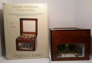 Mr.  Christmas Grand Animated Concertina Music Box,  50 Songs,  Lights,  Ice Skaters