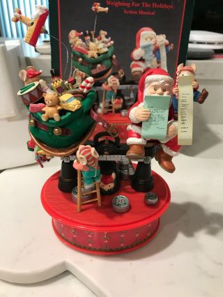 Enesco Small World Of Music Weighting For The Holidays Wind - Up Action Musical