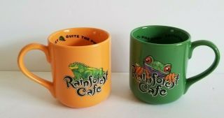 Set Of 2 Colorful Rainforest Cafe Large Mugs Iggy (orange) & Cha Cha (green)