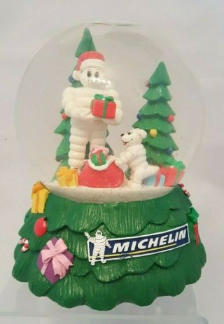 Michelin Man Glass Musical Snow Globe Music Box W/ Mr Bib Dog Christmas Globe