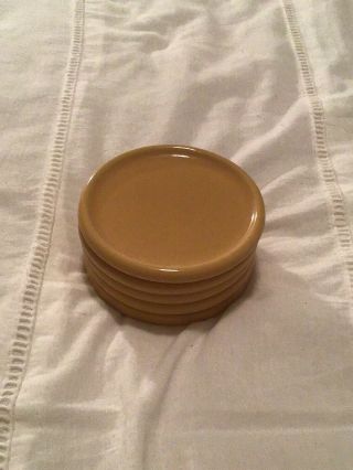 Longaberger Pottery Coasters/lid/candle Plate