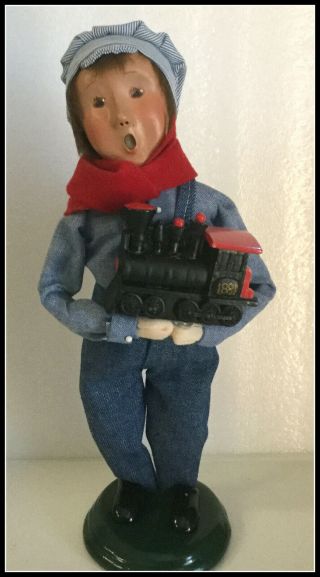 Byers Choice 2001 Young Boy Train Conductor Holding Toy Train