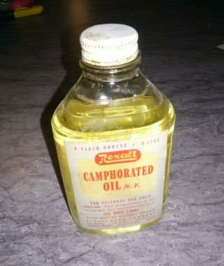 Vintage 4oz Rexall Pharmacy Camphorated Oil Clear Glass Bottle Nearly Full U1753