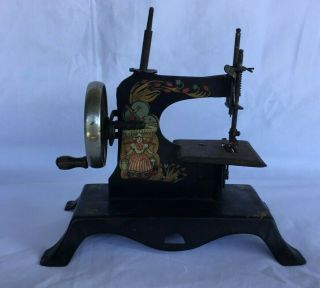 Antique Childs Miniature Hand Crank Toy Sewing Machine Dutch Girl & Windmills