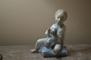 Nao Lladro Figurine Boy In Pajama Sitting On A Pillow With His Dog Rare Retired