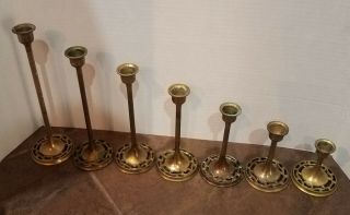 Set Of 7 Vintage Brass Graduate Candle Sticks Holders Ornate Stands
