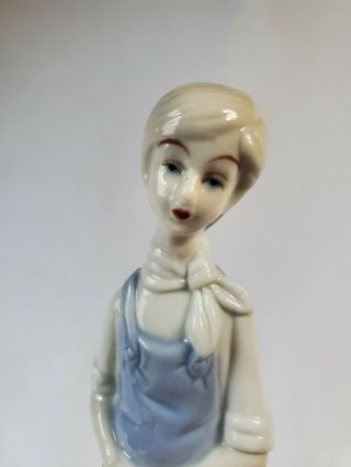 Vintage Porcelain Lady with Dog at Fence Figurine Blue Overalls Lladro 