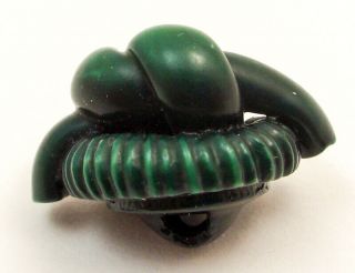 Vintage green celluloid button,  extruded knot,  approx 7/8 