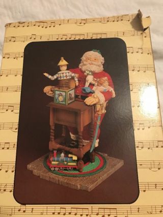 Enesco Moving Santa Claus With His Toys 