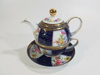 Lillian Vernon Stacking Tea Pot,  Cup And Saucer.  Floral,  Blue And Gold Trim
