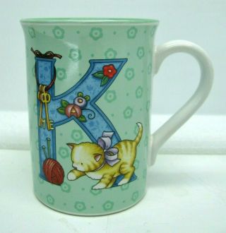 Mary Engelbreit Mug Coffee Cup 2003 Green Kitten Playing With Yarn Letter K