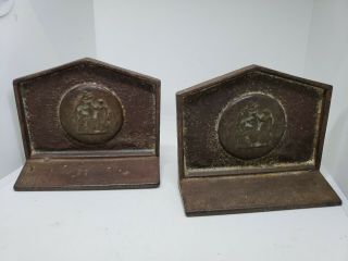 Vintage Cast Iron Book Ends With Medallions