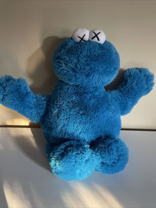 Authentic Kaws X Sesame Street Uniqlo Plush Cookie Monster (from Uniqlo).