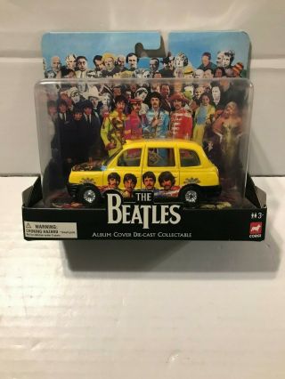 Corgi The Beatles Sgt Peppers Album Cover Die Cast Taxi