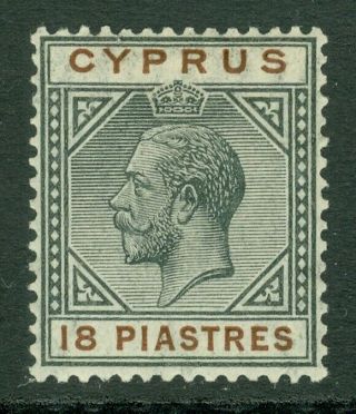 Sg 98 Cyprus 1921 - 23.  18pi Black & Brown.  Lightly Mounted Cat £90
