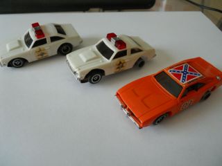 Vintage 1981 The Dukes Of Hazzard Slot Cars General Lee Sheriff Afx Tyco