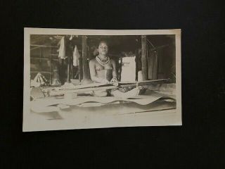 Sarawak B/w Real Photo Postcard Of Nude Sea Dyak Girl Weaving In Building.