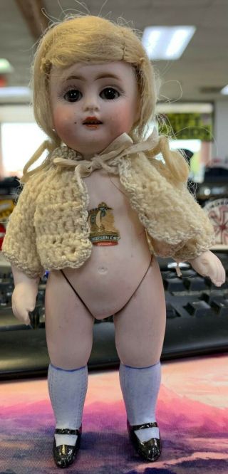 6.  5 Inch Antique Kestner All Bisque Doll With Label On Chest