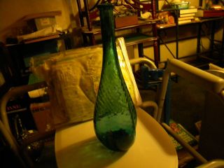 Large Glass Teal Bottle Marked On The Bottom Made In Italy,  Some Bubbles,  Wavy.