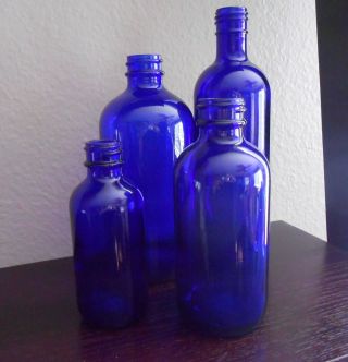 Vintage Cobalt Blue Glass Bottles - Set Of 4