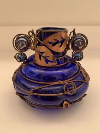 Vintage Cobalt Blue Glass Vase With A Unique Wire Design