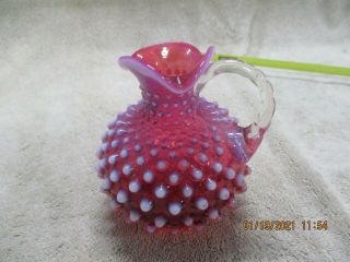 Glass Cranberry Opalescent Hobnail Ribbed Handle Pitcher - - S32