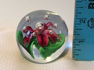 Dynasty Art Glass Paperweight 2 " Clear With Purple & Green Flower Inside