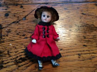 Antique All Bisque Doll.  Glass Eyes.  Fully Jointed 3
