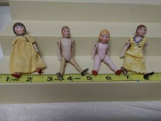 Antique All Bisque Dolls Set Of 4 Jointed Miniatute Dolls.  3 - 3/4 " - 4 "