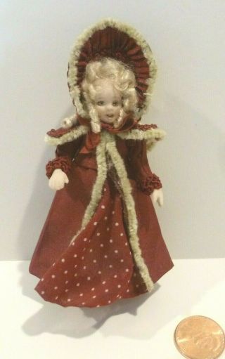 Viola Williams Dollhouse Miniature Little Girl Doll In A Maroon Dress & Bonnet