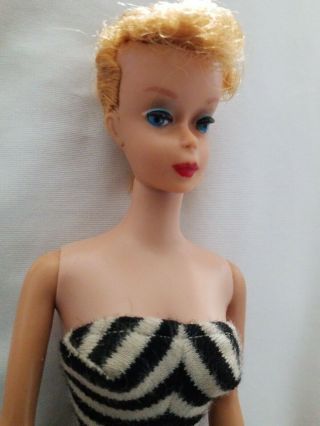 VINTAGE BARBIE 3 ? Hard body with suit.  Blue iris eyes,  no green 2
