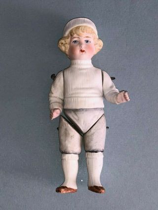 Bisque German Figurine Doll With Jointed Arms And Jointed Legs