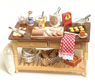 Dollhouse Miniature Baking Table Filled With Sweets And Food Preparation Items
