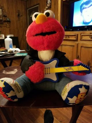 Rock & Roll Elmo W/guitar And Imitation Leather Jacket,