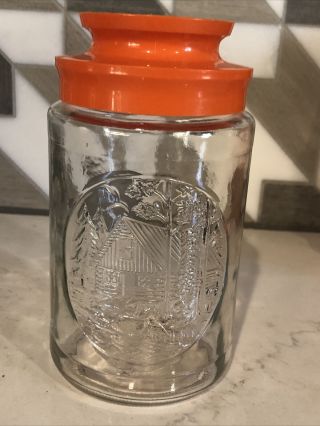 Vintage 1970s Anchor Hocking Glass Tang Jar With Cabin Outdoors Orange Lid