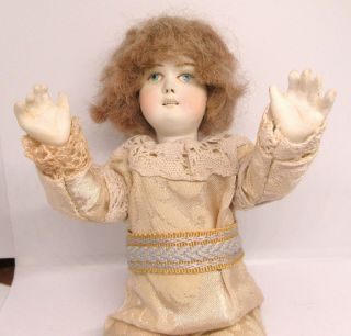 Antique Bisque Head &body Doll 9.  Inches Long.  Makers Mark Is.  2.  Gold Arrows