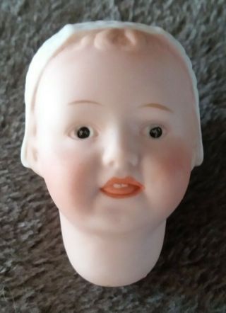 Antique German Porcelain Bisque Doll Head.