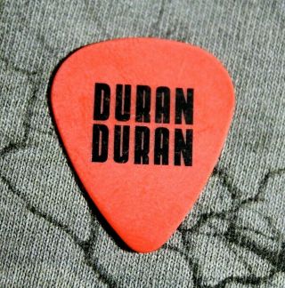 Duran Duran // John Taylor 2004 Astronaut Tour Guitar Pick // Orange/black