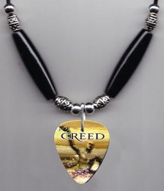 Creed Human Clay Guitar Pick Necklace