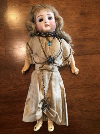 Antique dolls: porcelain,  bisque,  ceramic and/or cloth materials; 4 total 2
