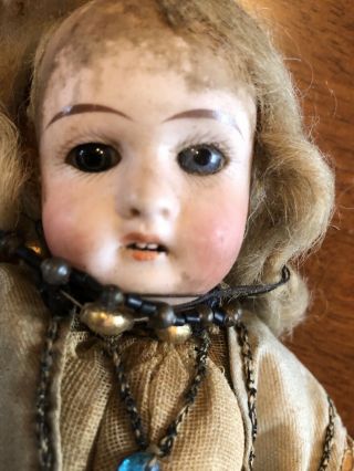 Antique dolls: porcelain,  bisque,  ceramic and/or cloth materials; 4 total 3