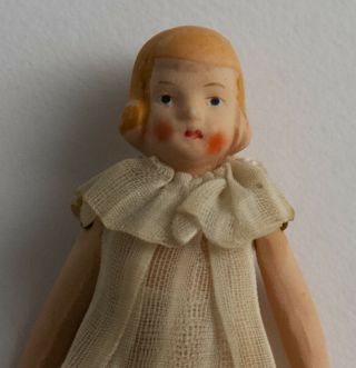 Antique Hertwig Miniature Bisque Girl Doll,  Hertwig of Germany,  1920s,  3.  25”tall 3