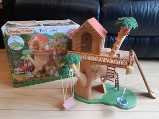 In boxes Sylvanian families Tree house 4618 and Walnut Squirrel family 4172 2