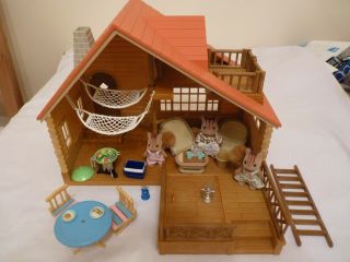 Sylvanian Families Log Cabin With Furniture And Squirrel Figures