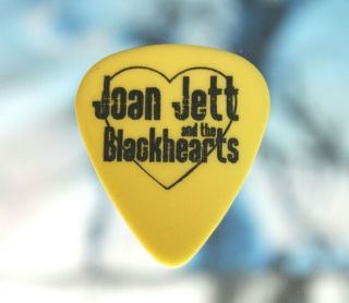 Joan Jett & The Blackhearts // 1996 Concert Tour Guitar Pick // Yellow/black