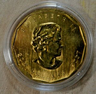 Canada.  2007 Maple Leaf 1 oz.  9999 Fine Gold $200.  Bullion Coin 2