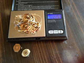 22.  6 Grams 14kt Gold Scrap/wear Stamped & 1 Day