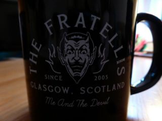 The Fratellis - Official " Me & The Devil " Black Coffee Mug -
