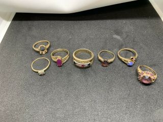 Seven 10k Rings With Various Stones 17.  7 Grams Gold