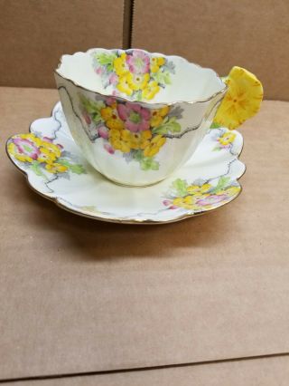 Paragon Flower Handle Cup And Saucer.